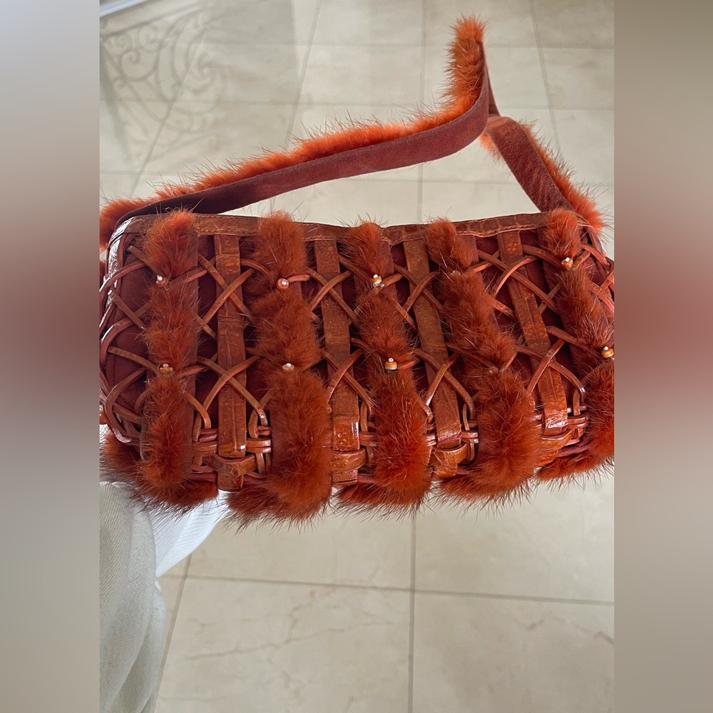 Vintage  rare Nancy Gonzales crocodile weaved orange bag with fox fur trimming.
